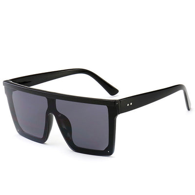 Oversize flat-top sunglasses with brown gradient lenses and a brown frame featuring a subtle leopard print. - Image 16