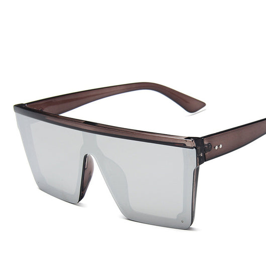 Oversize flat-top sunglasses with brown gradient lenses and a brown frame featuring a subtle leopard print. - Image 6