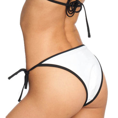 White bikini swimsuit with black contrast trim and long tie straps, modeled by a woman. - Image 4