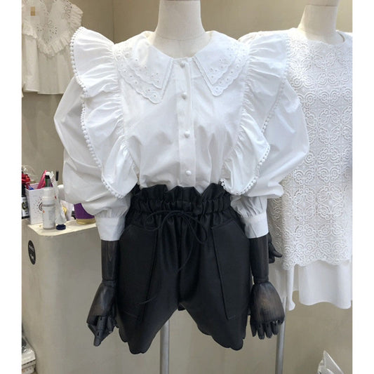 Blusa Francesa Elegante con Cuello Doblado y Detalles de Orejas de Madera