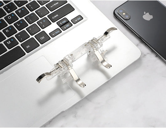 Six-finger linkage metal button gamepad in clear and silver, attached to a smartphone displaying a game. - Image 11