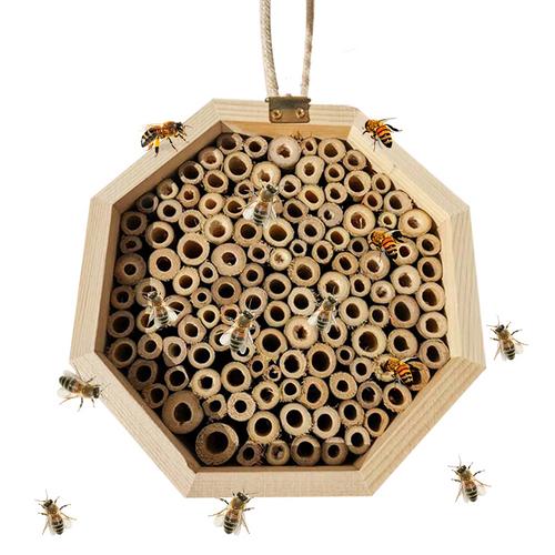 Three hexagonal wooden bee breeding boxes, filled with bamboo tubes, stacked together. The top box has a rope handle. - Image 4