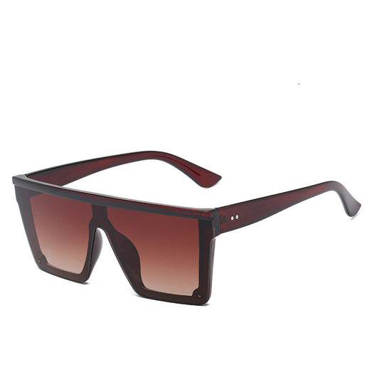 Oversized flat-top sunglasses with a brown tortoise shell frame and brown gradient lenses. - Image 19