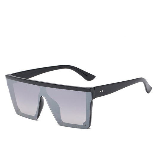Oversized flat-top sunglasses with a brown tortoise shell frame and brown gradient lenses. - Image 24