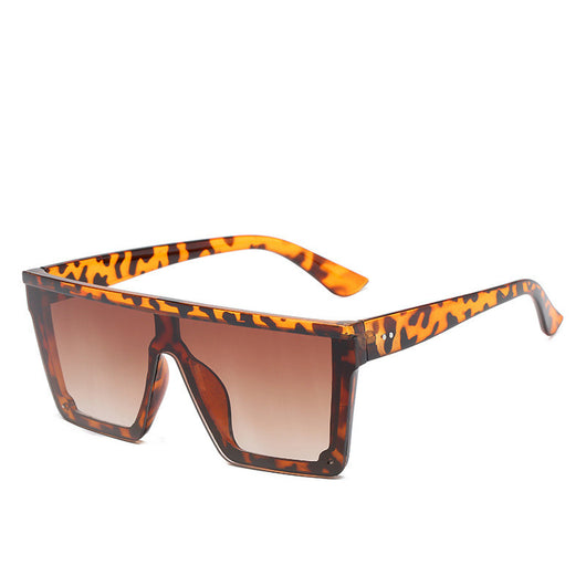 Oversized flat-top sunglasses with a brown tortoise shell frame and brown gradient lenses. - Image 26