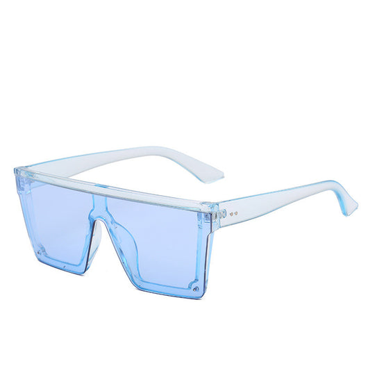Oversized flat-top sunglasses with a brown tortoise shell frame and brown gradient lenses. - Image 14