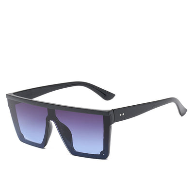 Oversized flat-top sunglasses with a brown tortoise shell frame and brown gradient lenses. - Image 15