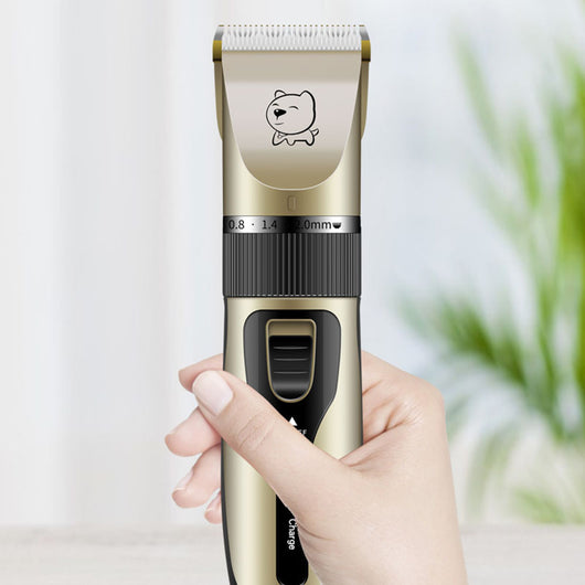 Gold and black rechargeable pet hair clipper kit with four guide combs, cleaning brush, oil, and USB cable. - Image 3