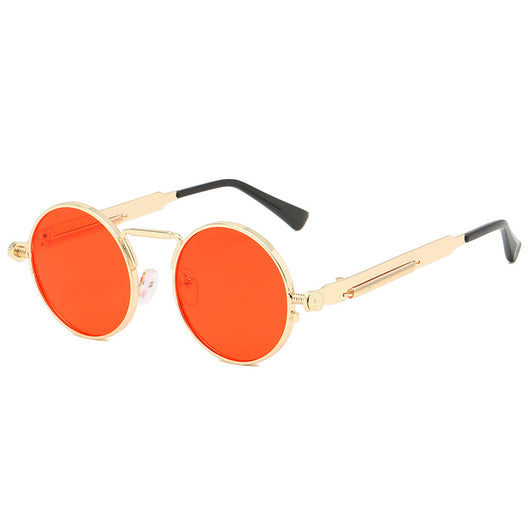 Round red lens sunglasses with a black metal frame and unique spring-leg temples on a white background. - Image 11