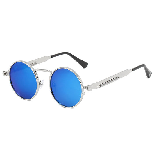 Round red lens sunglasses with a black metal frame and unique spring-leg temples on a white background. - Image 6
