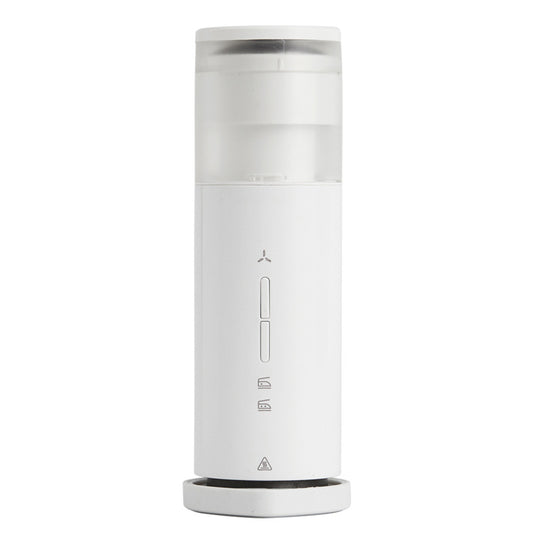 White wireless handheld electric iron and lint remover in use on a white shirt, with close-ups of its features.