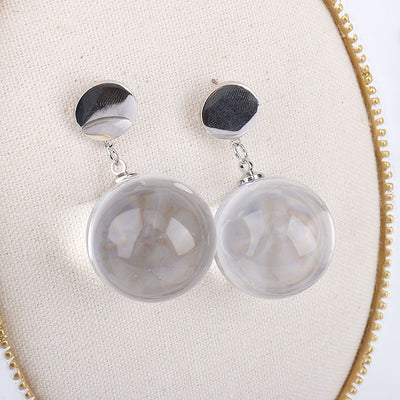 Aretes Redondos Transparentes - Image 3