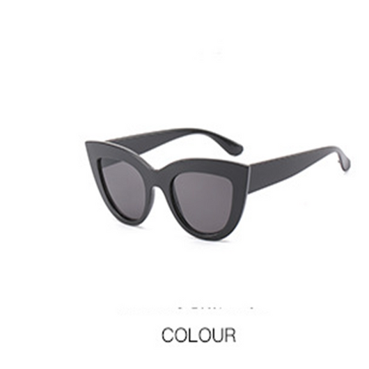 White cat-eye sunglasses with purple gradient lenses, featuring a retro and trendy style. - Image 12