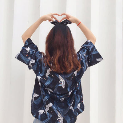 Ropa de Protección Solar Suelta Talla Plus con Estampado de Grúa - Image 9