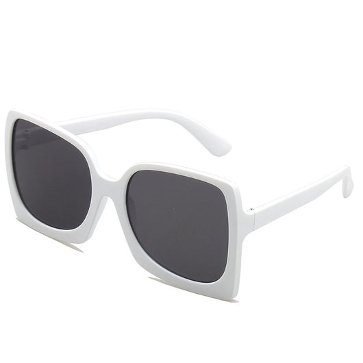 Oversized square-frame sunglasses with translucent peach frames and brown gradient lenses on a white background. - Image 8