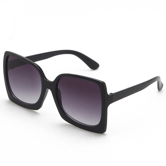 Oversized square-frame sunglasses with translucent peach frames and brown gradient lenses on a white background. - Image 7