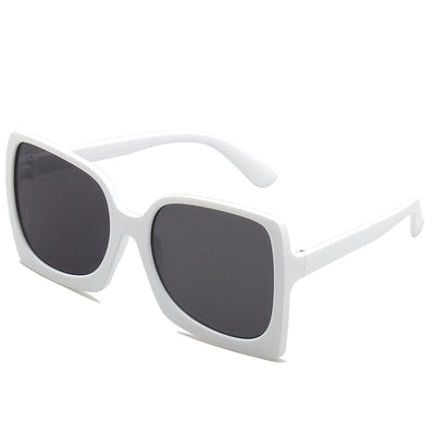 Oversized square-frame sunglasses with translucent peach frames and brown gradient lenses on a white background. - Image 3