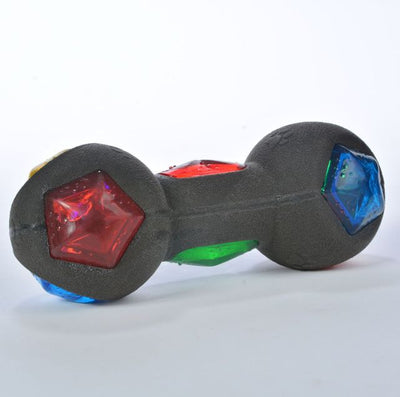 Black rubber dumbbell dog toy with red, blue, green, and yellow luminous faceted inserts. - Image 8