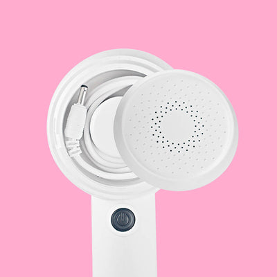 White rechargeable fabric shaver with a circular perforated head and a blue power button on the handle. - Image 8