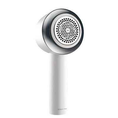 White rechargeable fabric shaver with a circular perforated head and a blue power button on the handle. - Image 2