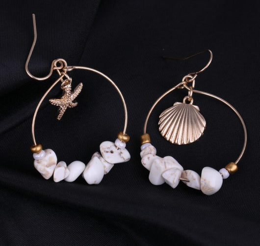Aretes Estrella de Cinco Puntas en Metal Salvaje con Concha Marina - Image 9