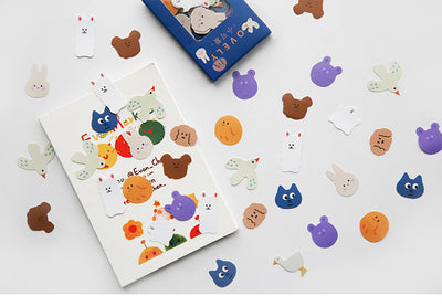 Six boxes of assorted stickers, including themes like geometry, fruits, planets, and cute characters, displayed on a white surface. - Image 19