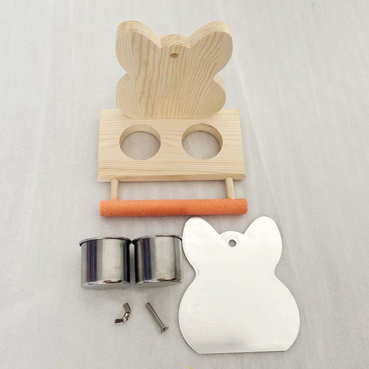 Parrot puzzle bird toy with a wooden stand, mirror, two stainless steel food cups, and an orange perching bar. - Image 6