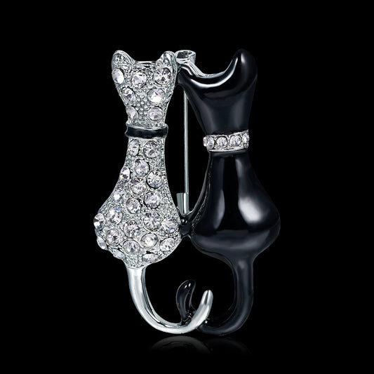 Broche Doble Zorro Diamante en Blanco y Negro