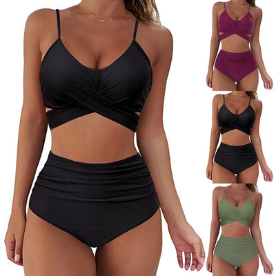 Teal wrap-around bikini top with high-waisted bottoms featuring a vibrant tropical leaf print in blue, pink, and purple. - Image 3