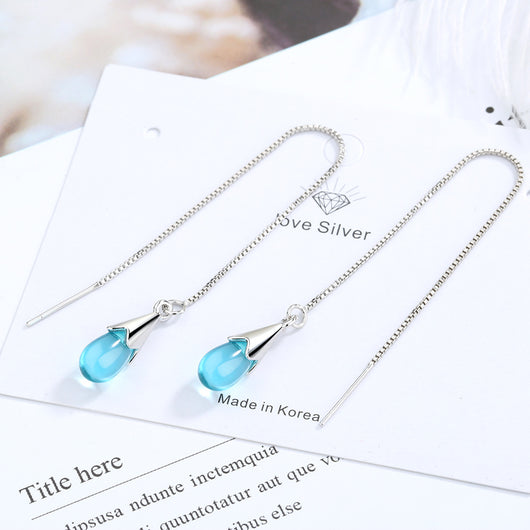 Aretes Largos de Gota Azul con Borla Elegante - Image 9