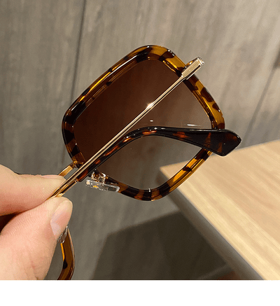 Retro big frame square brown sunglasses for women with white outer frames and gold-toned inner rims. - Image 3