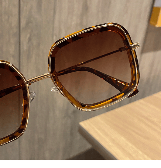 Retro big frame square brown sunglasses for women with white outer frames and gold-toned inner rims. - Image 4