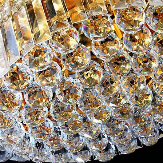 Clear faceted crystal ball bead, possibly K9 crystal, with a hole for stringing, against a dark background. - Image 10