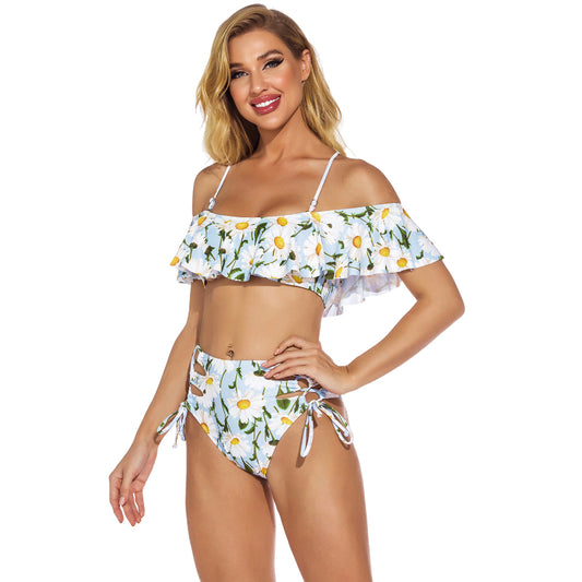 Women's light blue daisy floral print bikini with ruffled off-shoulder top and high-waisted lace-up bottoms.
