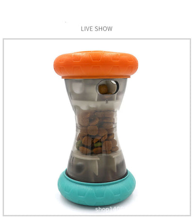 Blue and orange pet food leakage toy, shaped like a dumbbell, filled with kibble, with a bulldog in the background. - Image 11