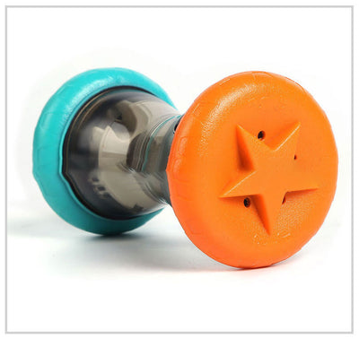 Blue and orange pet food leakage toy, shaped like a dumbbell, filled with kibble, with a bulldog in the background. - Image 6