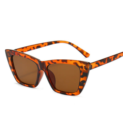 Tortoise shell square sunglasses with brown lenses, featuring a subtle cat-eye shape for a fashionable look. - Image 4