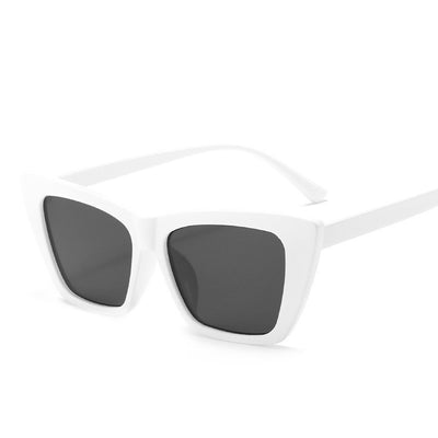 Tortoise shell square sunglasses with brown lenses, featuring a subtle cat-eye shape for a fashionable look. - Image 6