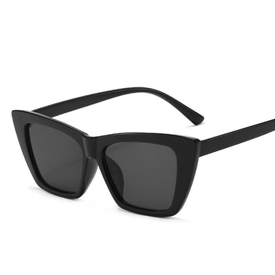 Tortoise shell square sunglasses with brown lenses, featuring a subtle cat-eye shape for a fashionable look. - Image 7