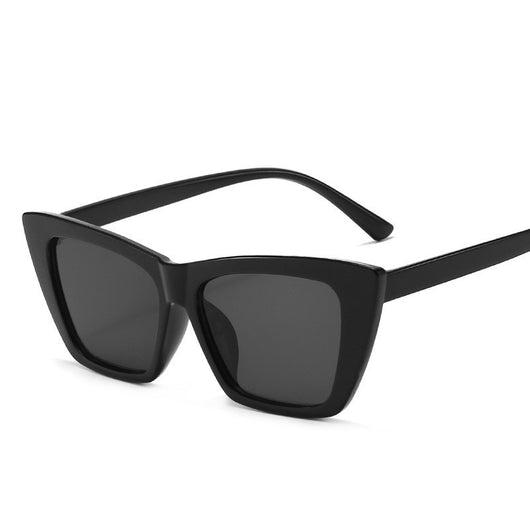 Tortoise shell square sunglasses with brown lenses, featuring a subtle cat-eye shape for a fashionable look. - Image 7