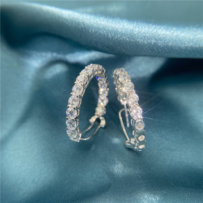 Aretes de Diamante Incrustado en Acero de Alto Carbono con Destello Brillante - Image 8