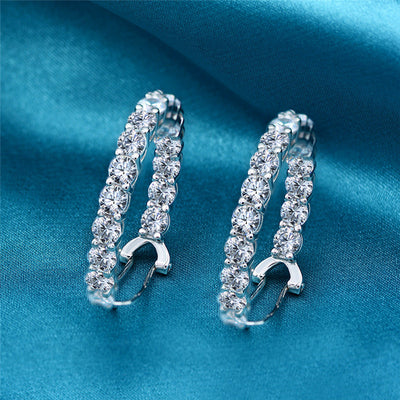 Aretes de Diamante Incrustado en Acero de Alto Carbono con Destello Brillante - Image 10