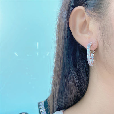 Aretes de Diamante Incrustado en Acero de Alto Carbono con Destello Brillante - Image 4