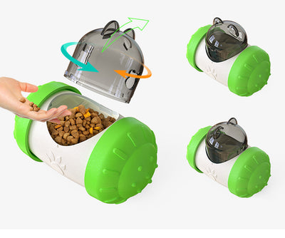 Pink and white bear-shaped pet treat dispenser toy filled with kibble, with a kitten and dog in the background. - Image 19