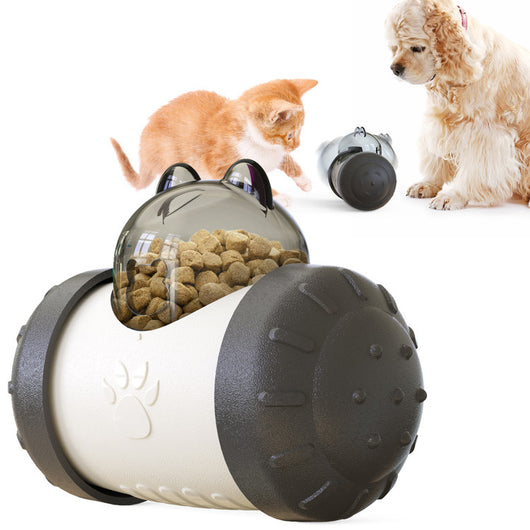 Pink and white bear-shaped pet treat dispenser toy filled with kibble, with a kitten and dog in the background. - Image 5