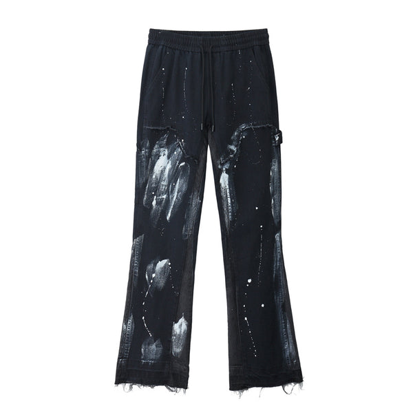 Jeans Deconstruidos con Detalles de Pintura y Tinta
