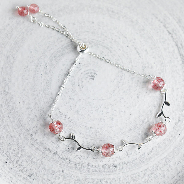 Pulsera de Plata con Rama Floral y Cristal de Fresa