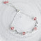 Pulsera de Plata con Rama Floral y Cristal de Fresa