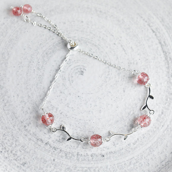 Pulsera de Plata con Rama Floral y Cristal de Fresa