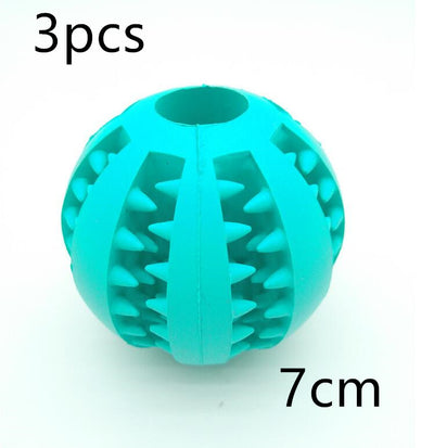 Teal rubber slow feeder dog toy ball with internal spikes for teeth cleaning and treat dispensing, 7cm size. - Image 6